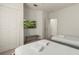 Welcoming bedroom with two twin beds and a convenient bench at 8968 Silver Pl, Kissimmee, FL 34747