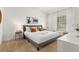 Spacious bedroom with a king-size bed and neutral decor at 8968 Silver Pl, Kissimmee, FL 34747