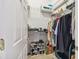 Walk-in closet with shelving and hanging rods at 227 Verona Dr, Poinciana, FL 34759