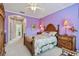 Spacious Primary bedroom with ensuite bathroom and walk-in closet at 227 Verona Dr, Poinciana, FL 34759