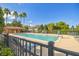Relaxing community pool with lounge chairs and a shaded cabana at 227 Verona Dr, Poinciana, FL 34759