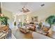 Bright and airy living room with ample seating at 227 Verona Dr, Poinciana, FL 34759