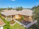Single-Gathering home with a landscaped yard and driveway at 227 Verona Dr, Poinciana, FL 34759