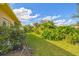 Well manicured backyard with lush landscaping at 227 Verona Dr, Poinciana, FL 34759
