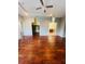 Spacious bedroom with hardwood floors, walk-in closet, and attached bathroom at 1980 Poblado Ct, Kissimmee, FL 34744
