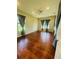 Spacious bedroom with hardwood floors and neutral walls at 1980 Poblado Ct, Kissimmee, FL 34744