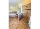Updated bathroom with walk-in shower, built-in seat, and tiled floors at 1980 Poblado Ct, Kissimmee, FL 34744