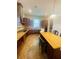 Large kitchen with granite countertops and island at 1980 Poblado Ct, Kissimmee, FL 34744