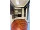 Large walk-in closet with custom shelving and rods at 1980 Poblado Ct, Kissimmee, FL 34744