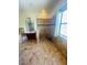 Large bathroom with walk-in shower, built-in seat, and double vanity at 1980 Poblado Ct, Kissimmee, FL 34744