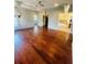 Large bedroom with hardwood floors and access to bathroom and walk-in closet at 1980 Poblado Ct, Kissimmee, FL 34744