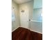 Entryway with hardwood floors and six-panel door at 1980 Poblado Ct, Kissimmee, FL 34744