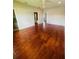 Spacious bedroom with hardwood floors and ceiling fan at 1980 Poblado Ct, Kissimmee, FL 34744