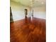 Spacious bedroom with hardwood floors and ceiling fan at 1980 Poblado Ct, Kissimmee, FL 34744