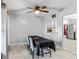 Bright dining room with table and chairs, view into kitchen at 1500 8Th Se St, Winter Haven, FL 33880