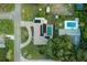 Aerial view of house, pool, and surrounding neighborhood at 1500 8Th Se St, Winter Haven, FL 33880