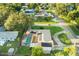 Aerial view showing home with pool and solar panels at 1500 8Th Se St, Winter Haven, FL 33880