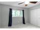 Light and airy bedroom with double door closet and window at 1500 8Th Se St, Winter Haven, FL 33880