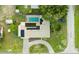 Home with pool and solar panels, seen from above at 1500 8Th Se St, Winter Haven, FL 33880
