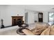 Cozy living room featuring a brick fireplace at 1500 8Th Se St, Winter Haven, FL 33880
