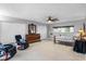 Spacious main bedroom with two recliners and window at 1500 8Th Se St, Winter Haven, FL 33880