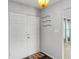 Bright entryway with double doors and coat rack at 1500 8Th Se St, Winter Haven, FL 33880