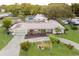 Single story home with pool and circular driveway at 1500 8Th Se St, Winter Haven, FL 33880