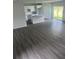 Modern kitchen features white cabinets and a center island at 1339 Tallahassee Ct, Kissimmee, FL 34759