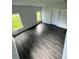 Spacious bedroom with vinyl flooring and natural light at 1339 Tallahassee Ct, Kissimmee, FL 34759