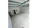 Attached garage with automatic opener and concrete floor at 1339 Tallahassee Ct, Kissimmee, FL 34759