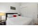Bedroom with a queen-sized bed and ample closet space at 2771 Cedaridge Cir, Clermont, FL 34711