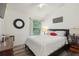Bedroom with a queen-sized bed and plenty of closet space at 2771 Cedaridge Cir, Clermont, FL 34711