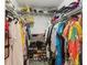 Large walk-in closet with ample shelving and hanging space at 2771 Cedaridge Cir, Clermont, FL 34711