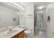 Bathroom with tub shower combo and updated vanity at 2771 Cedaridge Cir, Clermont, FL 34711