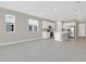 Open floor plan with kitchen, living room and island at 4216 Sawtooth Ct, Tavares, FL 32778