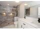 Modern bathroom with marble shower and double vanity at 10633 Watertown Ct, Orlando, FL 32821