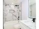 Modern bathroom with marble shower and vanity at 10633 Watertown Ct, Orlando, FL 32821