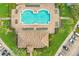 Community pool and clubhouse aerial view at 3301 Whitestone Cir # 308, Kissimmee, FL 34741
