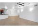 Open living room with tile floors and ceiling fan at 3301 Whitestone Cir # 308, Kissimmee, FL 34741