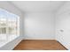 Bright bedroom featuring wood floors and a double door closet at 3301 Whitestone Cir # 308, Kissimmee, FL 34741