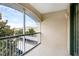 Private screened balcony overlooking community amenities at 3301 Whitestone Cir # 308, Kissimmee, FL 34741