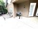 Propane grill and lounge chairs on the pool deck at 2556 Bear Creek Ct, Kissimmee, FL 34747
