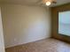 Bedroom with tile flooring and window coverings at 4311 Sw 53Rd Ter, Ocala, FL 34474