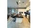 Modern kitchen with an island, stainless steel appliances and breakfast bar at 166 Captiva Dr, Davenport, FL 33896
