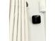 Interior security camera installed near curtains at 457 Prestwick Pl # 457, Kissimmee, FL 34759