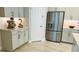 Kitchen features stainless steel appliances and light cabinets at 13706 Werrington Dr, Winter Garden, FL 34787