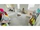 Playroom with a teepee, table, and play kitchen at 13706 Werrington Dr, Winter Garden, FL 34787