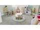 Playroom featuring a teepee, table and chairs, and play kitchen at 13706 Werrington Dr, Winter Garden, FL 34787
