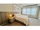 Spacious Primary bedroom with a king-size bed and wall-mounted TV at 13706 Werrington Dr, Winter Garden, FL 34787