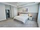 Large Primary bedroom with a king-size bed and calming decor at 13706 Werrington Dr, Winter Garden, FL 34787